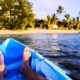 guest rumours-rarotonga-man in kayak feet returning